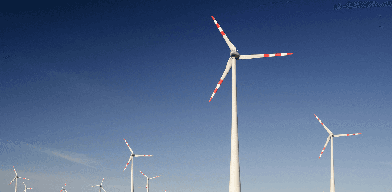 Wind turbines in a green field